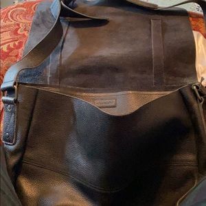 Black pebbled leather messenger bag. Gently used.